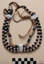Necklace, blue & white discoidal glass beads on brown cloth cord