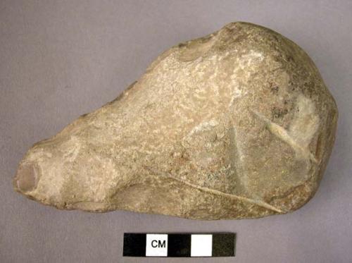1 very heavily rolled Acheulian-type handaxe made on a flint pebble