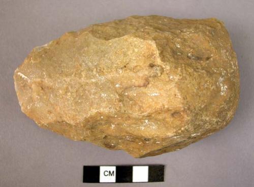 Medium-sized quartzite hand axe roughly oval in form with pebble butt