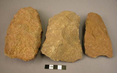 3 quartzite cleavers with "U" -shaped butt ends, and straight (1), convex (1), a