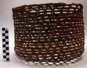Round basket, open hexagonal weave, dark brown fibre, diameter 11", height 7.5"