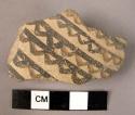 Ceramic body sherd, grey ware with black painted open cable design
