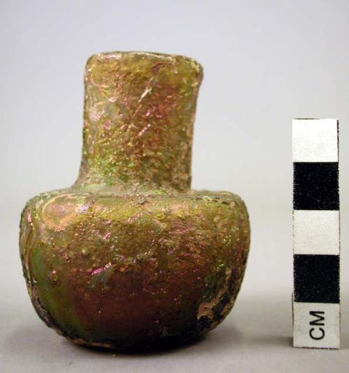 Bottle of green phoenician glass