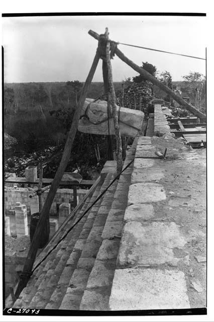 N.W. Colonnade. Showing restoration of serpent head in N. balustrade of stairway