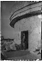 Caracol, native Maya boy in western doorway