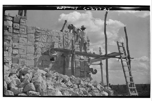 Restoring mask panel at the Temple of Warriors