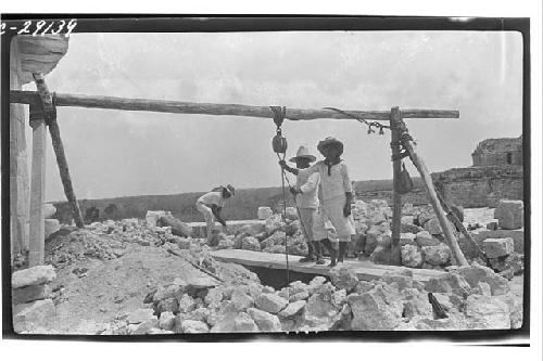 Caracol. Excavation of circular substructure, SW corner.