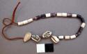 Pieces of purple wampum from fragment of an old belt