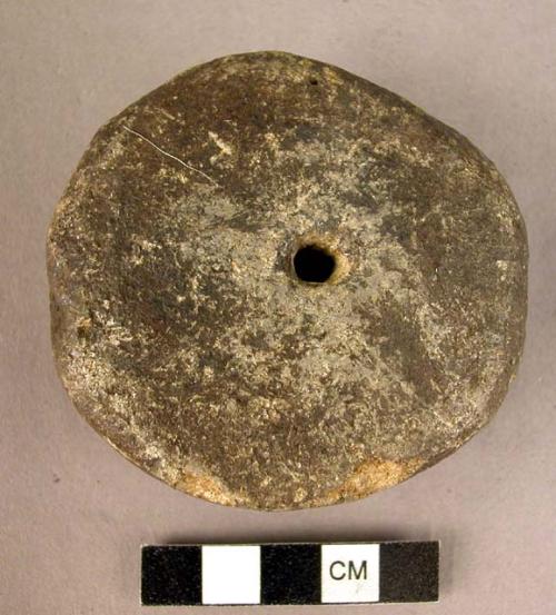 Perforated stone disc