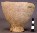 Ceramic, complete footed cup with sherds, mended, plain