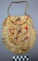 Leather bag with quillwork floral designs and fringed edging.