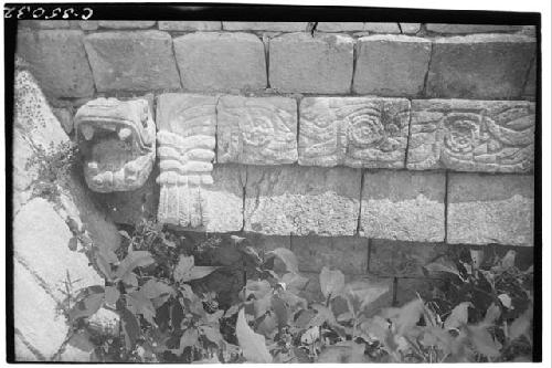 Serpent cornices at Northeast Colonnade