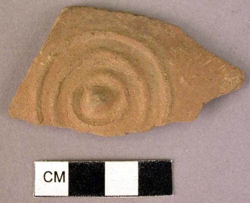 Brown potsherd - pattern of 3 raised circles surrounding raised lump (stamped?)