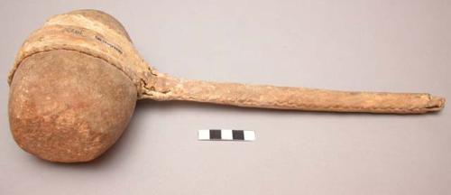 Plains fixed stone headed maul, possibly Cheyenne. Wood handle w/ rawhide cover