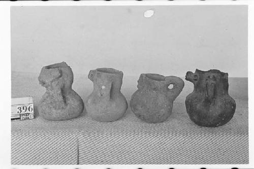 Four Small Pottery Jars