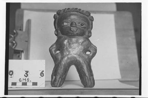 Archaic upper level style figurine Pupils have been added since finding.