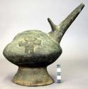 Black pottery vessel, human figure ornament, with 2 spouts and stirrup handle