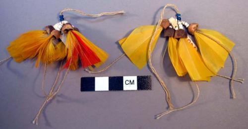 Feather, bead, and seed ornaments