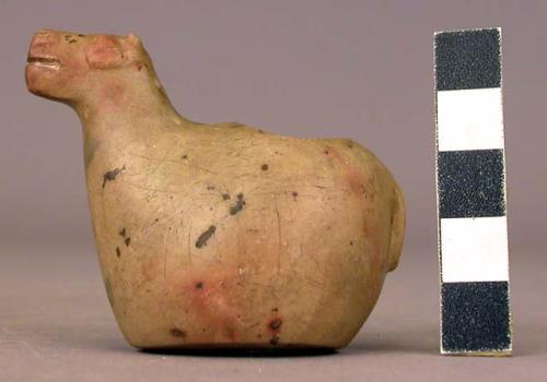 Ground stone, animal effigy vessel