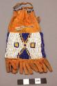 Sioux paint bag. Lazystitch beadwork covers body of bag. White ground w/ blue &