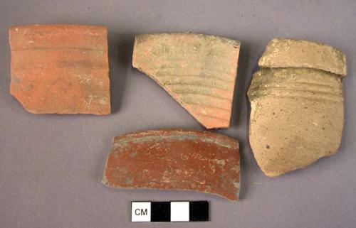 Ceramic sherds, red ware, wheel made, some with grooved design