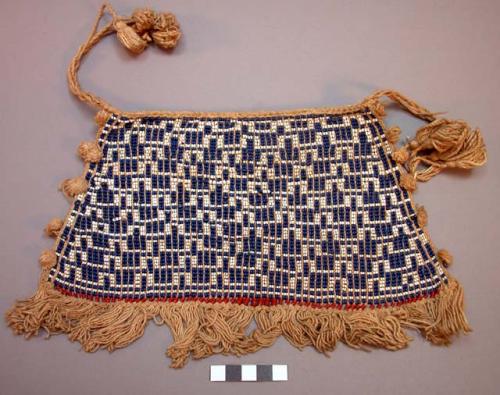 Small beadwork apron with fringe and tassels of string
