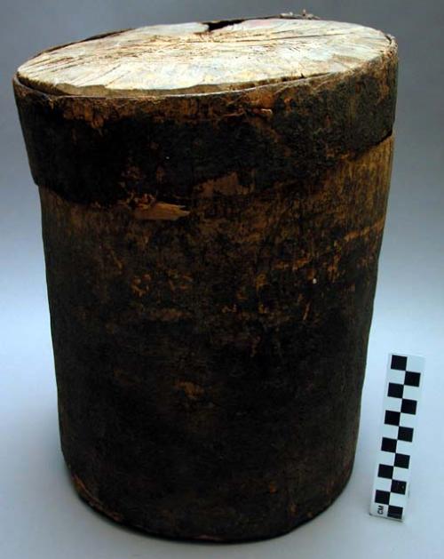 Bark pail containing paraphenalia for nge cult ceremonies