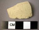 Ceramic rim sherd, fine white ware, undecorated, incurvind rim