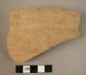 Cermaic rim sherd, undecorated buff ware, thick walled