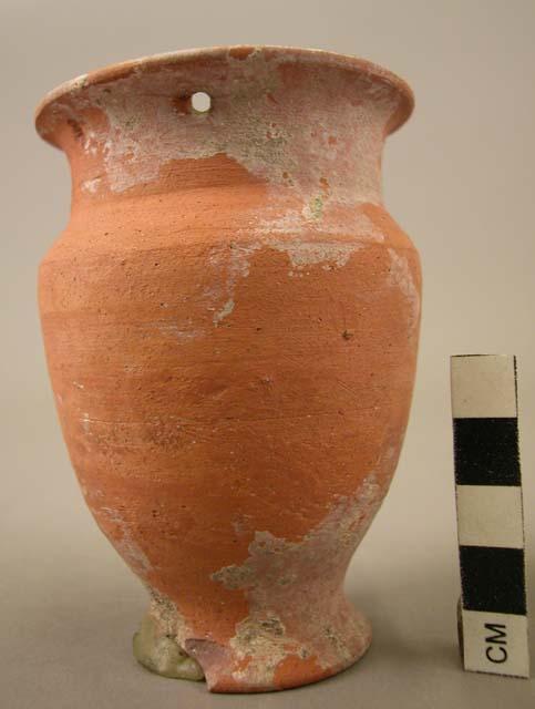 Ceramic jar, small, undecorated red ware, flared ring base, ovate body