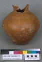 Restored jar - incised red polished ware (Class A)