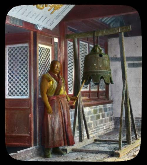 Lantern slide of monk with bell