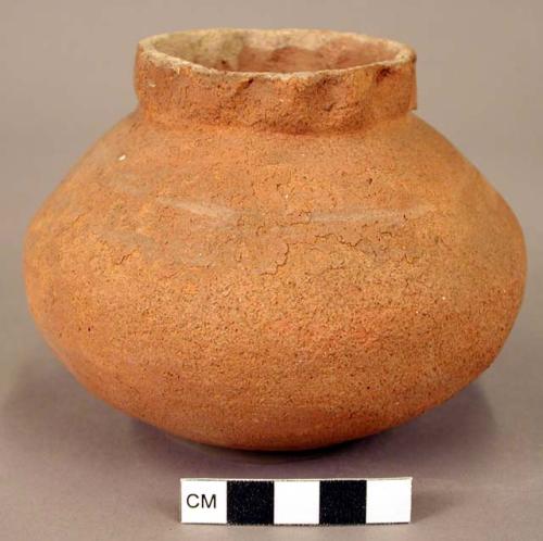 Ceramic jar, plain, notched rim, rounded bottom