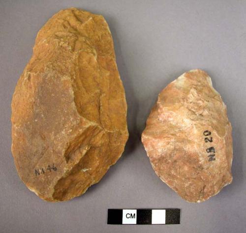 2 small/medium-sized quartzite hand axes of roughly oval or sub-triangular, made