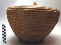 Large jar-shaped basket, coiled weave, knobbed cover, mbombo