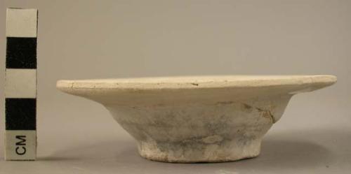 Glazed clay saucer