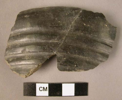 Grooved body potsherd of grey ware