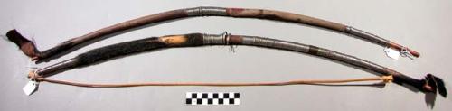 Bows, wood shaft, skin with fur, embossed metal wraps, 1 reed bowstring