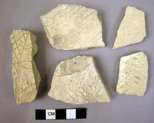 7 potsherds - unglazed white jugs