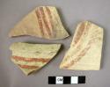 4 potsherds - scarlet ware or pink line ware