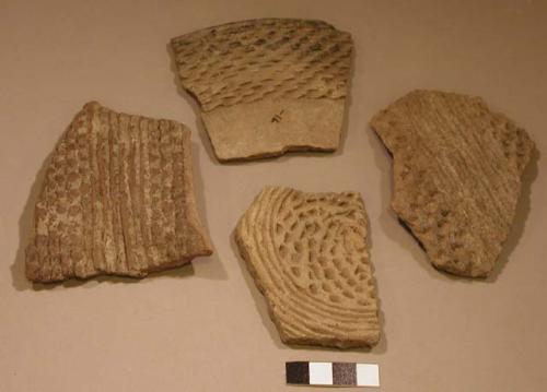 Ceramic rim and body sherds, incised, corrugated, punctate, cord impressed