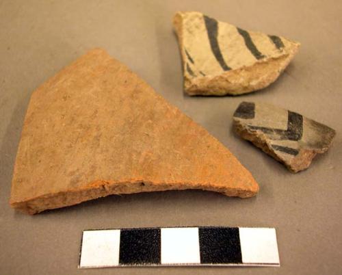 Ceramic rim and body sherds, black on white, polychrome, red slip