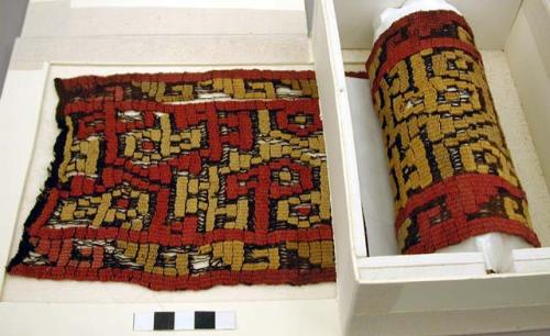 Organic, strip of woven tapestry, red, gold, and brown