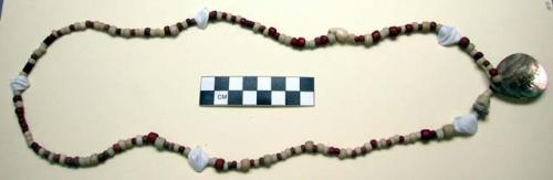 String of beads worn about the neck by women; also used as money