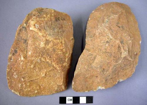 Large-sized quartzite cleaver with "U" shaped butts and oblique cutting edge