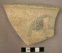 Crude buff ware rim sherd