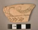 Painted rim potsherd - leopard design