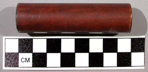 Metal tube, brass or bronze, with brownish exterior