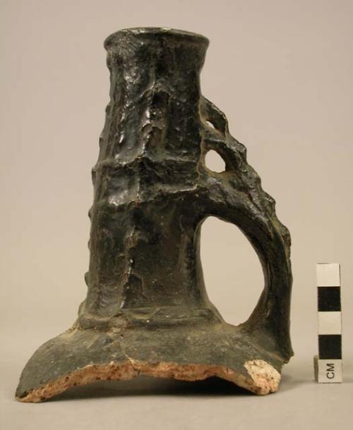 Fragment of thin neck, single-handled pottery jug