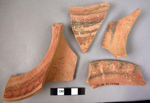 7 rim potsherds, painted